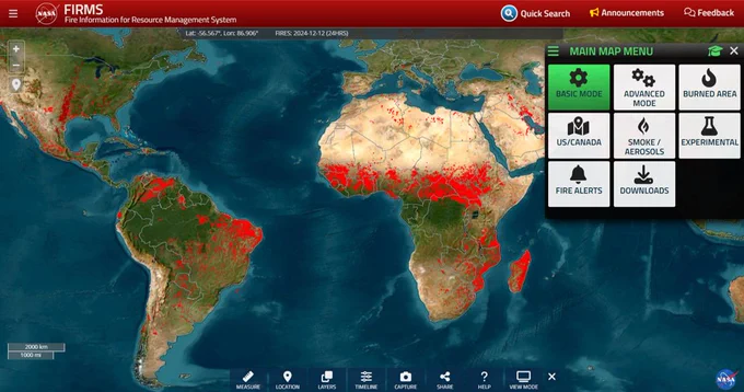 Screenshot of the NASA Fire Information for Resource Management System (FIRMS) taken on December 12, 2024. A global map is shown with red dots indicating active fire activity around the globe. The main map menu appears in the upper right corner of this image and shows the Basic Mode, Advanced Mode, Burned Area, US/Canada, Smoke/Aerosols, Experimental, Fire Alerts, and Downloads.