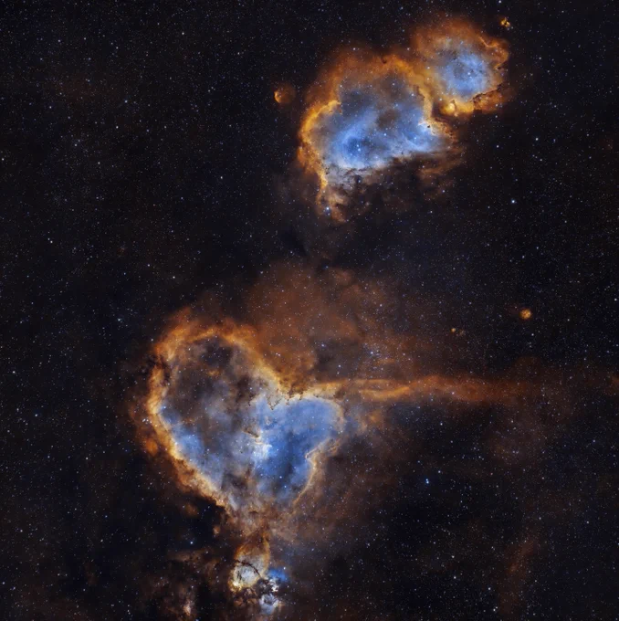 Heart and Soul by Imran Sultan. The Heart and Soul are two breathtaking nebulae in the Cassiopeia constellation, found over 7000 light years away. 