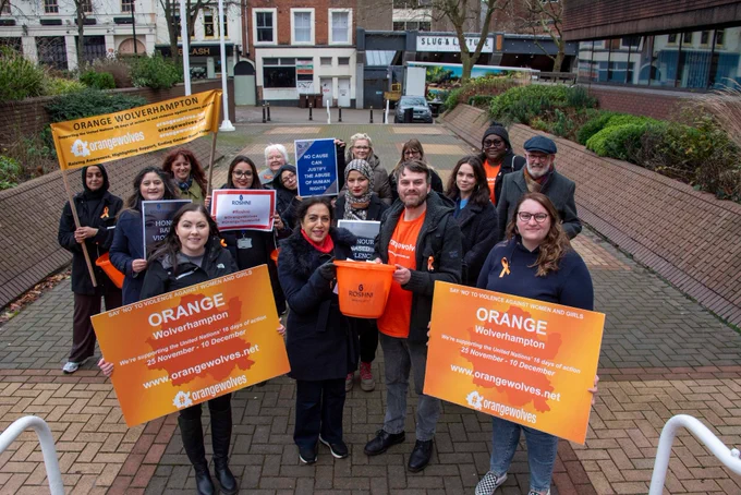 Image shows members of the Orange Wolverhampton team who took part in a closing ceremony outside the Civic Centre on Tuesday.