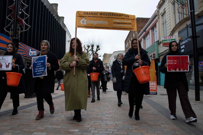 People joined a march around Wolverhampton city centre organised by ROSHNI to highlight the Orange Wolverhampton campaign.