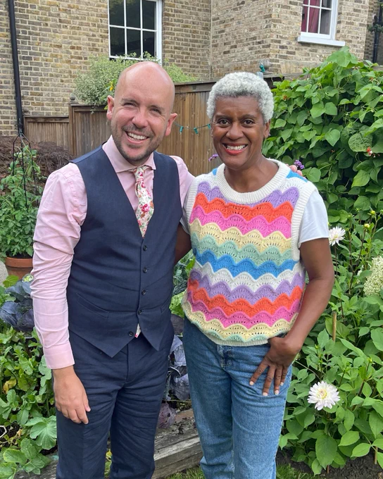 Tom Allen at home in his garden with Arit Anderson