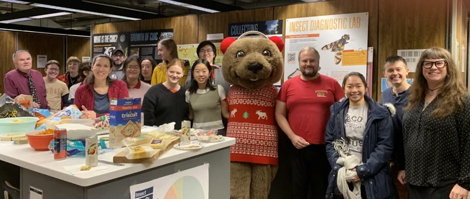 The staff and students of the Cornell University Insect Collection celebrate the end of the semester with Touchdown Cornell's bear mascot
