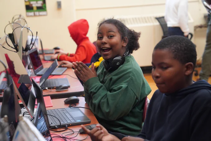 Students at PS 52 Magnet School learning how to code on computers for Computer Science Week.