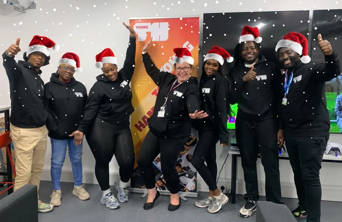 youth workers in Christmas hats