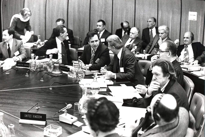 Gaston Geens chairing the first ESA Ministerial Council in 1977.

Other notable figures identifiable are Director General Roy Gibson, head of French delegation Michel Bignier and Harry Atkinson, UK delegation.