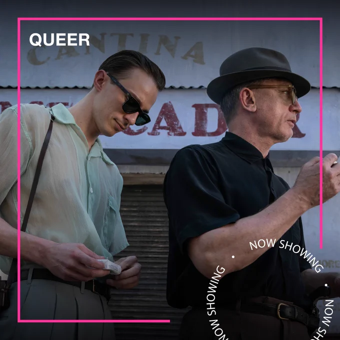 Two men in 1950s-style clothes and sunglasses stand outside a Cantina. Text - Queer, Now Showing
