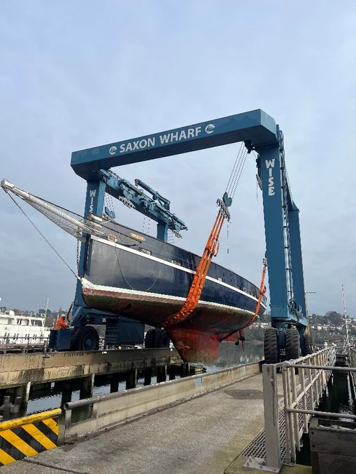 Prolific in the slings clear of the water with the keel visible