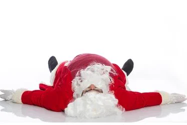 Santa is flat on his back