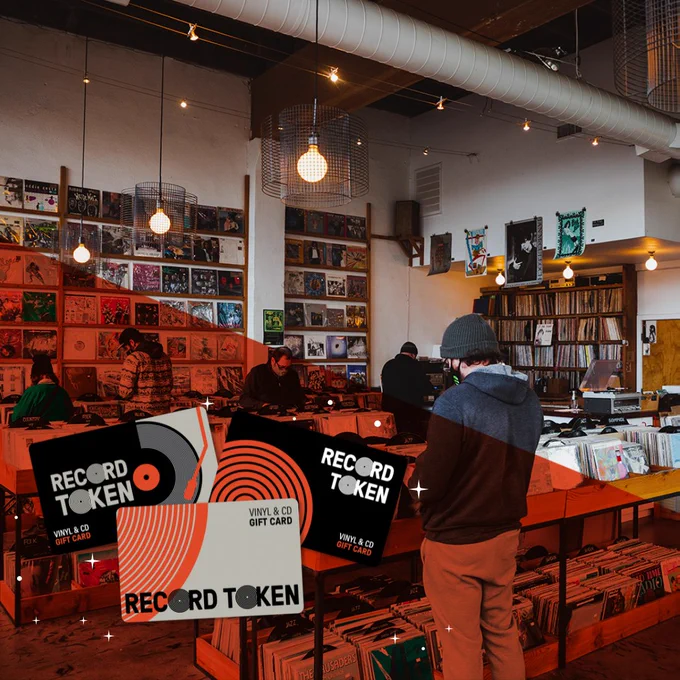 The inside of a busy record store. In the bottom left hand corner of the screen, an orange overlay is featured with sparkles, and three Record Tokens.