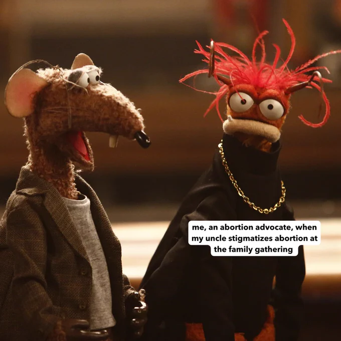 [Image description: Muppet characters Rizzo the Rat and Pepe the King Prawn engaging in a conversation, depicted humorously with a caption about a family gathering discussion.]