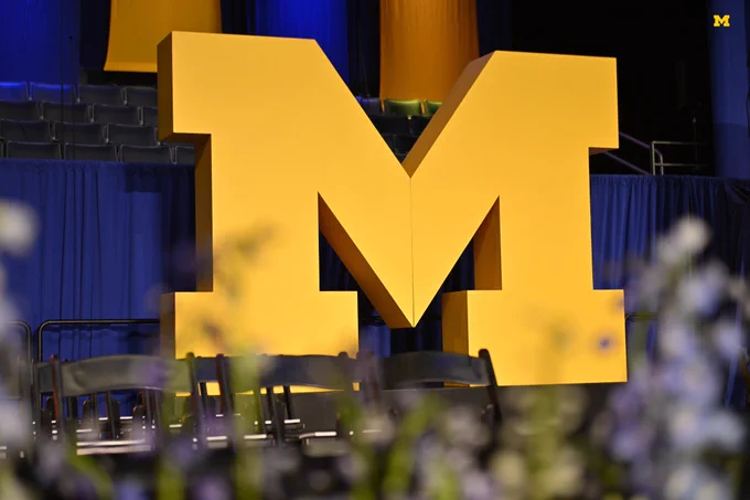 A Block M on stage at U-M’s 2023 Winter Commencement at Crisler Center.
