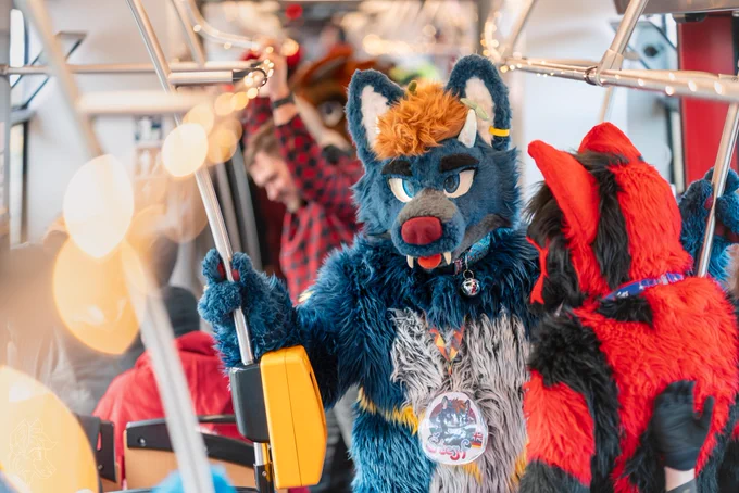 A picture of me amongst other suiters in a modern Prague tram.