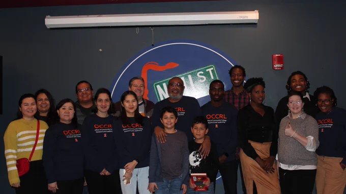 Staff members and friends of the Office of Community College Research and Leadership at Neil St. Blues in downtown Champaign
