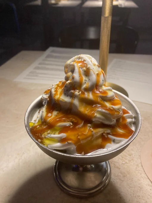 Oh my god it's such a beautiful dish of soft ice cream, you wouldn't believe it. Gentle waves of caramel cascading down the ridges, little pools of sesame oil and flecks of black salt. Oh my god it's so pretty 