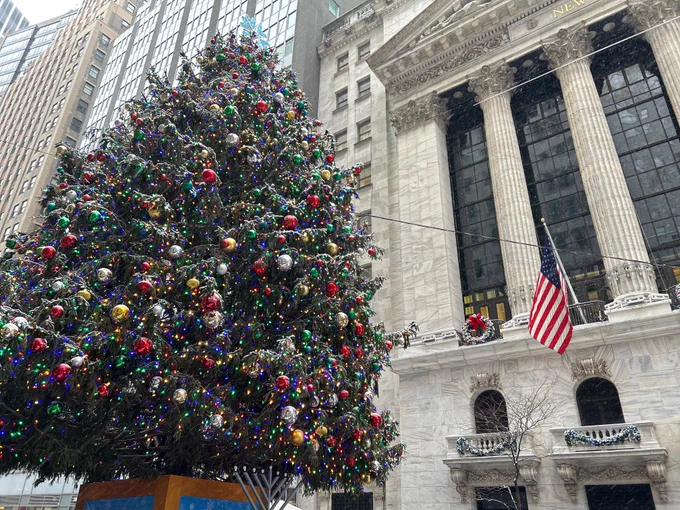 The colored picture is of the Christmas Tree in front of the New York Stock Exchange.