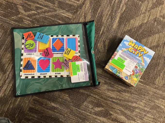 A chunky shape puzzle and game called Happy City for kids.