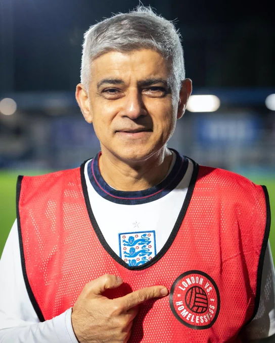 Sadiq Khan posing with ‘London VS Homelessness’ crest wearing football gear