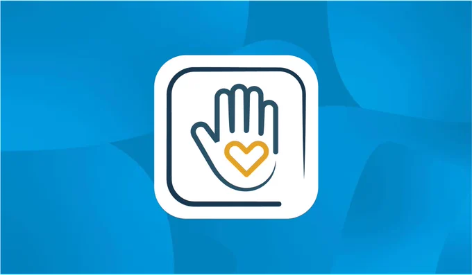 Main avec un cœur, symbole de solidarité 