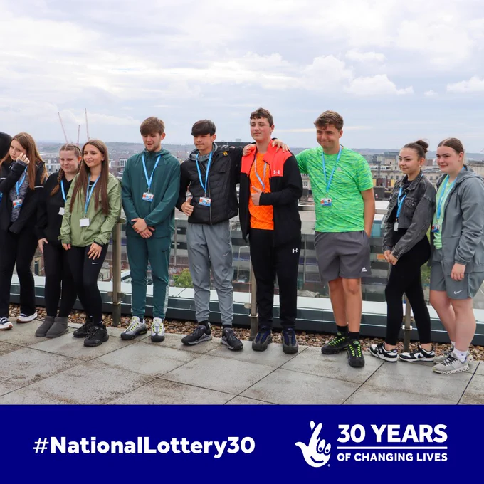 A group of young people smiling