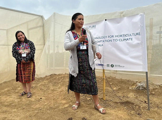 Sisters Maudilia and Lesbia Magaly Raxjal Casia, Mayan farmers and members of a local growers association, welcome visitors to their village farm site in Chuixilón, Santa Cruz Balanyá.