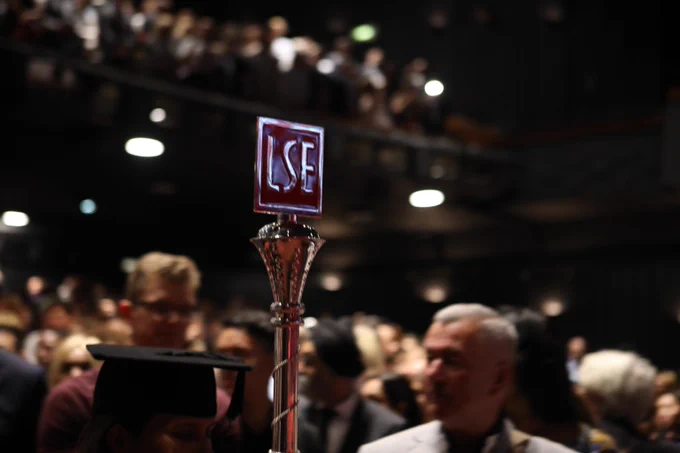 Close up of the LSE sceptre during a graduation ceremony in the Peacock Theatre