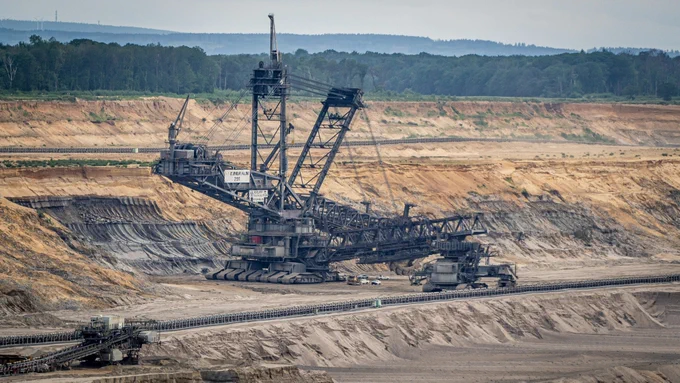 Source: Photo by Chris Munch on Unsplash
Description: Coal mining site
      
