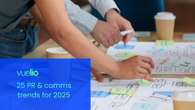 Photograph of a team planning campaigns on a table top, with the Vuelio logo and title '25 PR & comms trends for 2025' 