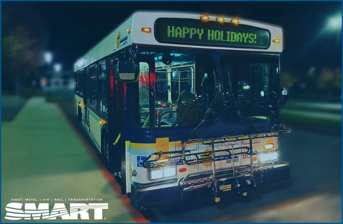 An image of a bus displaying "Happy Holidays" text, with a white SMART logo in the bottom left corner.