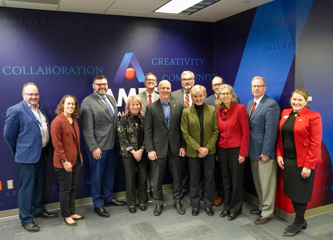 U.S. Energy Secretary Jennifer Granholm is photographed with Department of Energy and Ames National Laboratory staff.