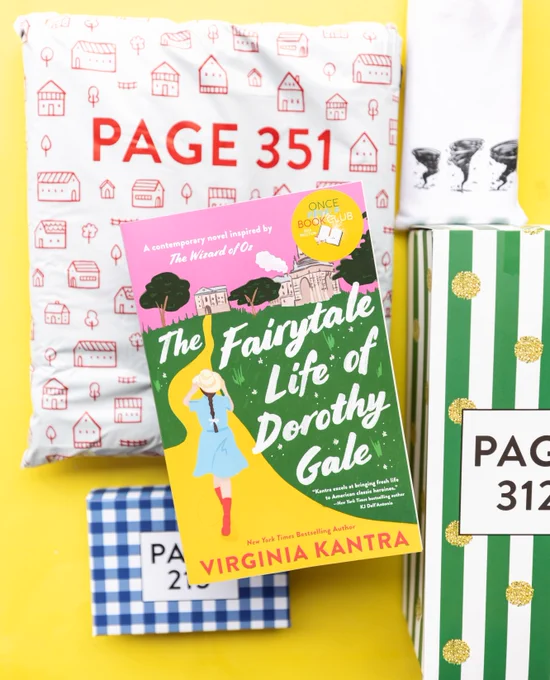paperback book lays on wrapped gifts labeled with page numbers on a yellow background