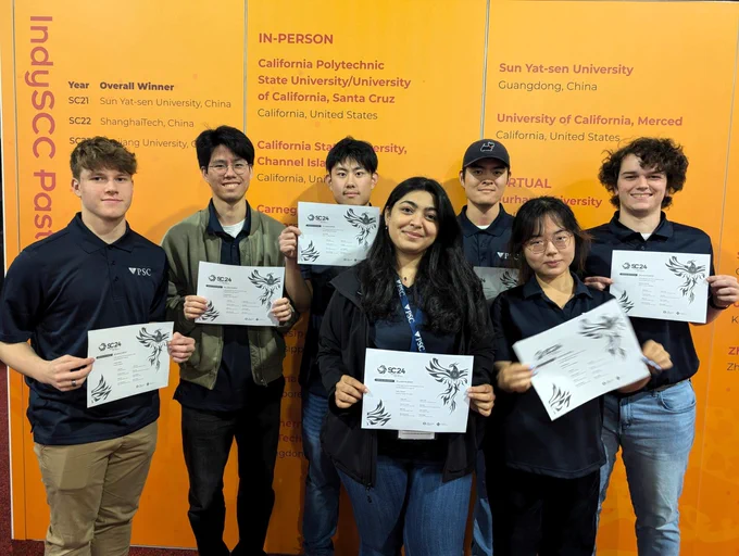 7 students show certificates from the IndySCC competition.