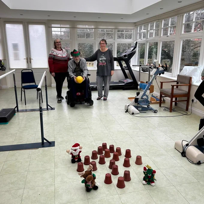 Richard playing flowerpot skittles
