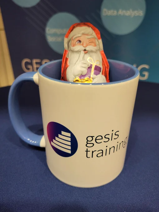 gesis training mug with a chocolate Santa inside.