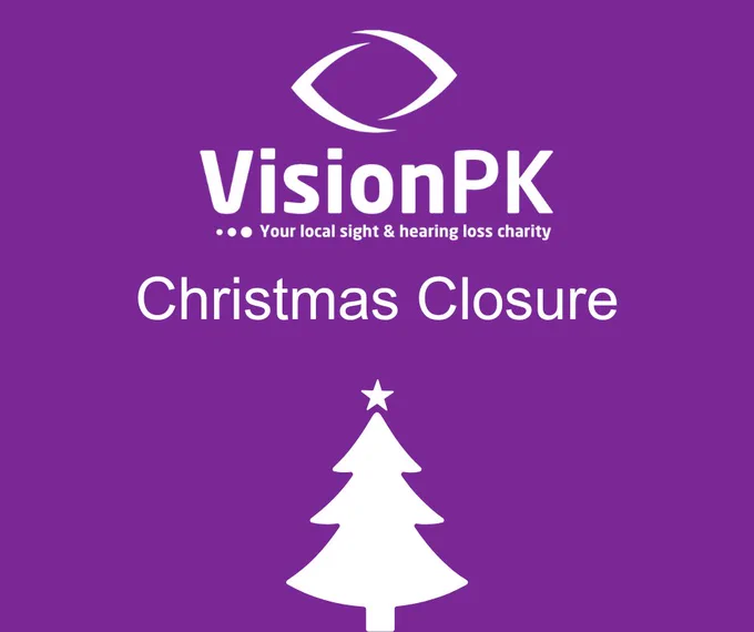 Purple background with a white christmas tree and christmas closure written above it