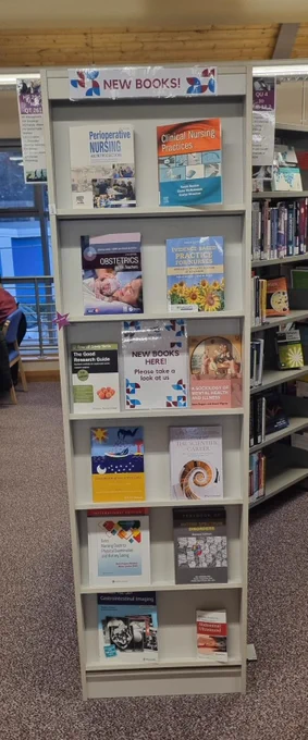 New books displayed on shelves.