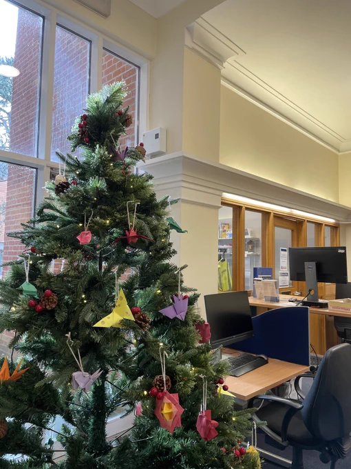 Library Christmas tree with office in background