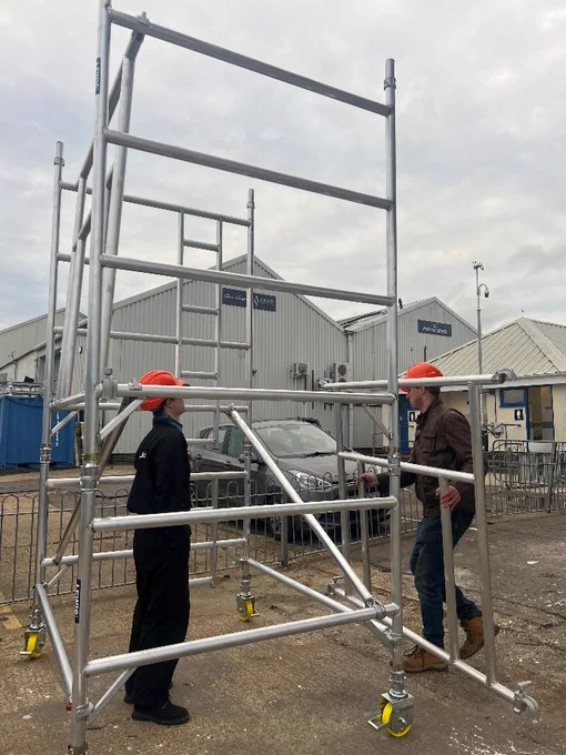 Refit team with a new scaffold tower