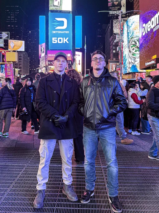 fajarty & dkdynamite in Time Square, New York. 

Posing in front of a (Photoshopped) billboard that reads ‘DETONATED 50k’