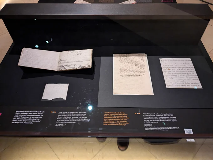 A photograph of one of the displays in the 'Write Cut Rewrite' exhibition, showing some of the works of Mary Shelley and Percy Bysshe Shelley to illustrate how they 'helped each other in their literary undertakings'.