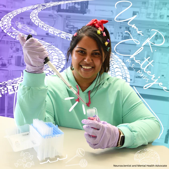 A vibrant image of Uma R. Chatterjee smiling in a lab setting. Uma wears a mint green hoodie, purple gloves, and a red hair scarf, with colorful butterfly clips in her hair. She holds a pipette in one hand and a test tube in the other, surrounded by scientific equipment. The background features a whimsical illustration of a racetrack and racecar, symbolizing Vanellope von Schweetz. Overlay text reads “Uma R. Chatterjee, M.S., MHPS” and “Neuroscientist and Mental Health Advocate.”