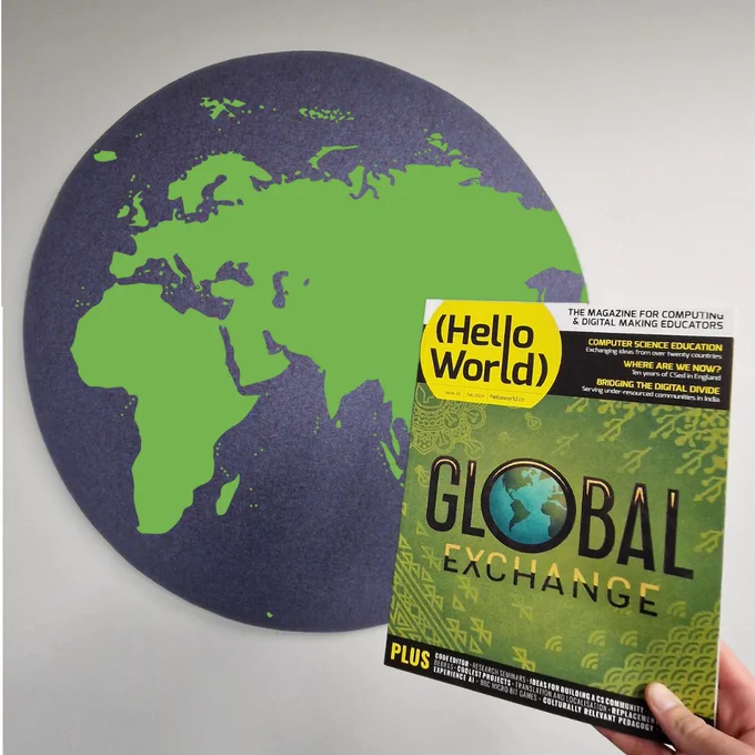 Photo of a physical copy of Hello World, Issue 23, 'Global Exchange' in the foreground. The background depicts a blue circle with the world's landmass superimposed on top of it to represent a globe.