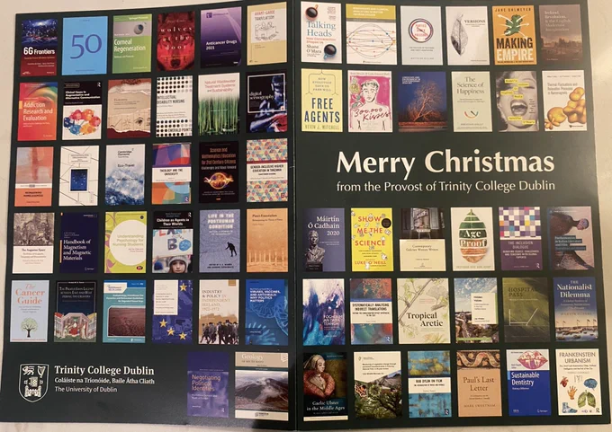Cover of Christmas card with text “Merry Christmas from the Provost of Trinity College Dublin” and depicting six rows of book covers of various colours with about 12 book covers on each row, all set against a dark green background.