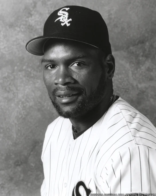 Black and white head and shoulders portrait of Tim Raines wearing a home pinstripe White Sox uniform. (National Baseball Hall of Fame and Museum)