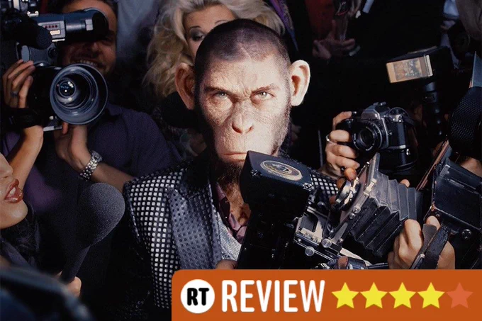 A monkey version of Robbie Williams surrounded by paparazzi and cameras, with an RT Review rating of four stars at the bottom.