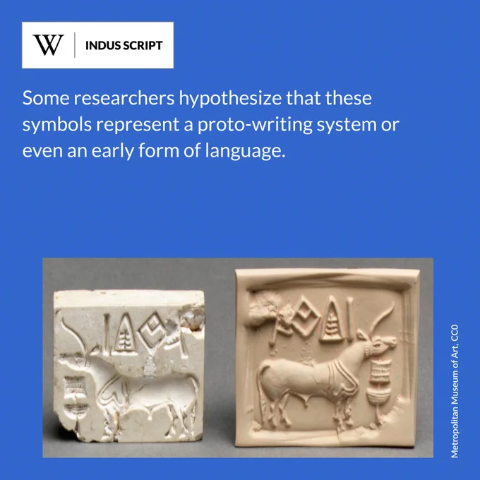 Two small clay pieces featuring intricately crafted animal figures on their surfaces. Text says: Some researchers hypothesize that these symbols represent a proto-writing system or even an early form of language.