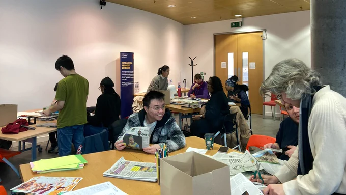 Workshop attendees enjoy a mood boarding activity.