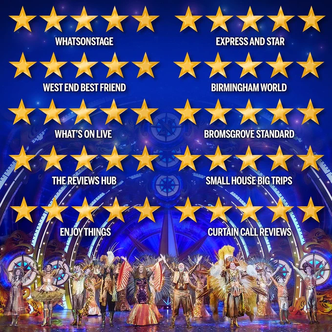 An on-stage group photo of elaborately dressed performers in Peter Pan surrounded by glowing arched windows, with glowing star ratings and reviews from various media outlets like WHATSONSTAGE and EXPRESS AND STAR displayed above.
