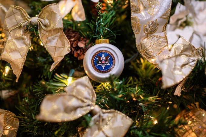 Photo of tree and ornament with the US Marshals seal on it.