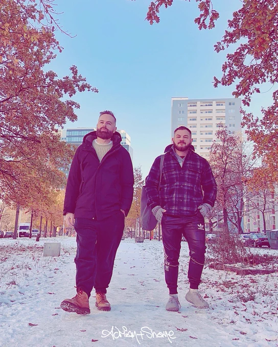 Adrian Shane wearing warm winter coats and boots, walking in the snow on a bright day. With tall buildings and clear blue sky in the background.






#christmas #christmaseve #merrychristmas #snow #whitechristmas #berlin #xmas #santa #santaclaus #winterwonderland #walk #walking #winter #december #queerart #queerartists #gayart #gayartists #portrait #selfportrait