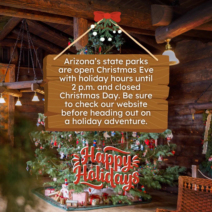 Happy Holidays message from Arizona State Parks, displaying festive holiday decorations inside a cozy cabin. The announcement states park hours for Christmas Eve and Christmas Day closing.